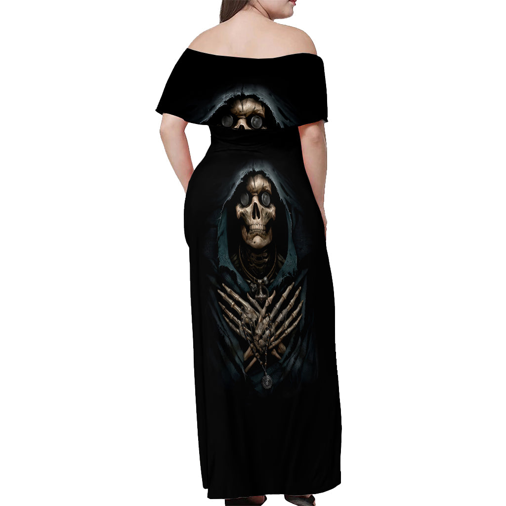 Black off-shoulder maxi dress with large skull and skeleton print, back view