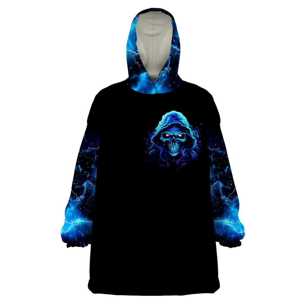 Wearable blanket hoodie, black with blue skull face graphic and galaxy-pattern sleeves