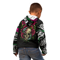 Black hoodie with skull-and-rose graphic and dice/skull sleeves, child wearing from behind