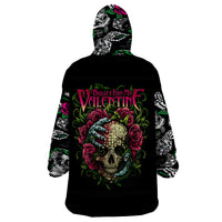Black blanket hoodie with hood, full-back skull and roses print, long sleeves.