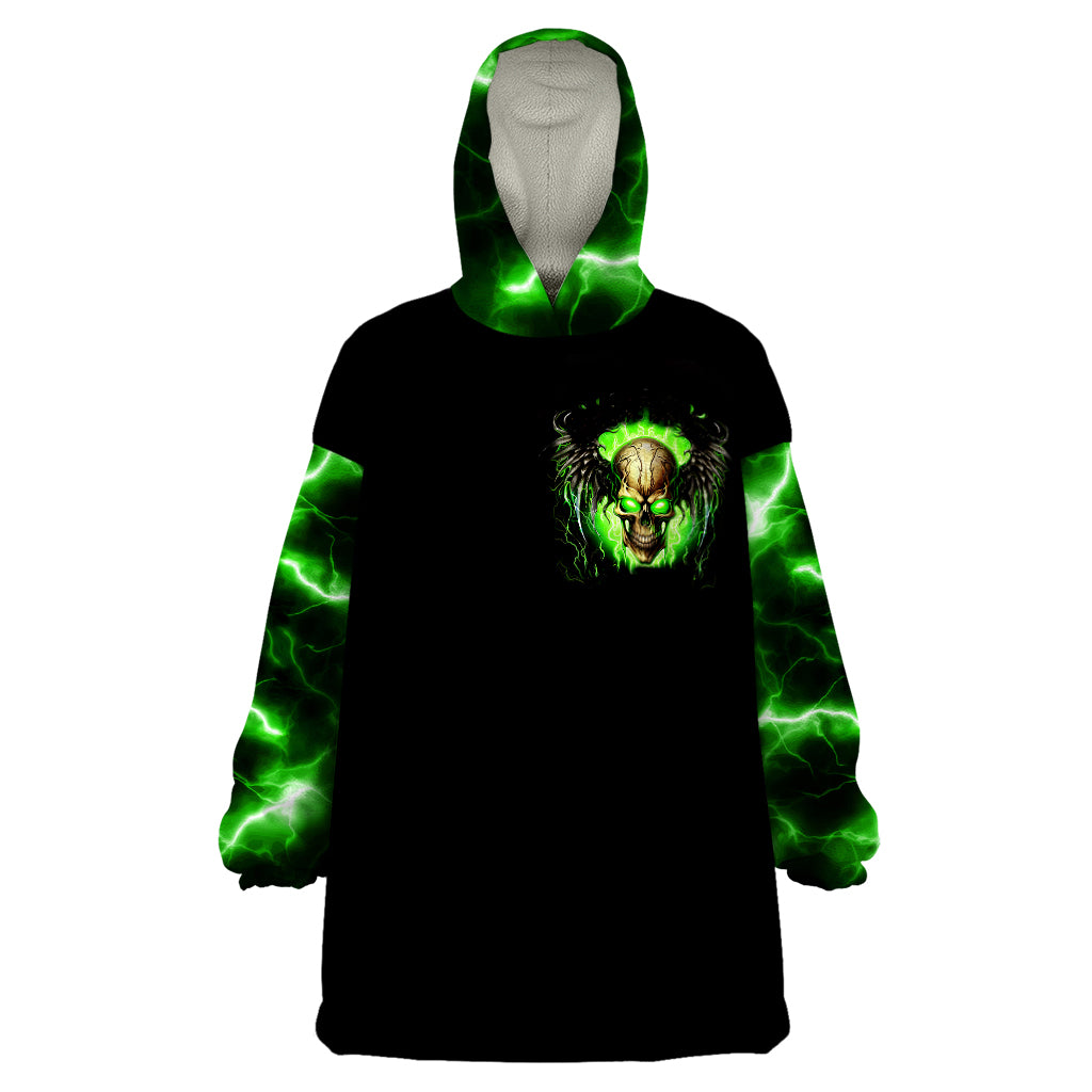 Black wearable blanket hoodie with green lightning sleeves and chest skull graphic