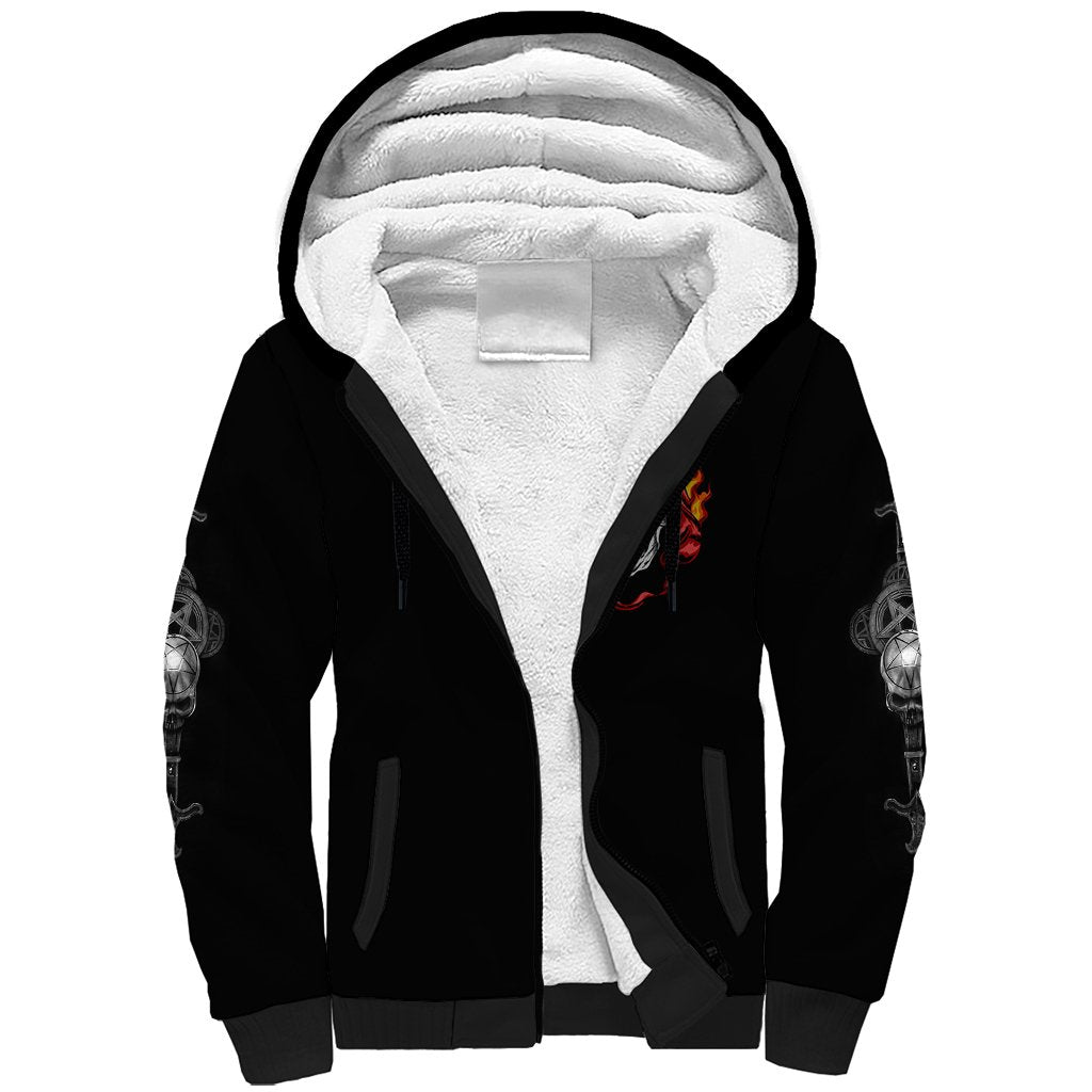 Black sherpa hoodie with white sherpa-lined hood and partial red skull graphic