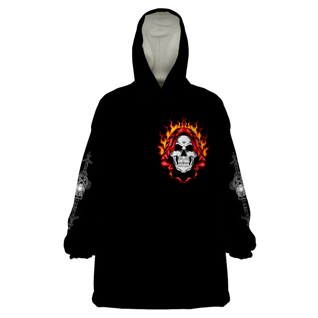 Black wearable blanket hoodie with flaming skull logo on chest, hood and long sleeves