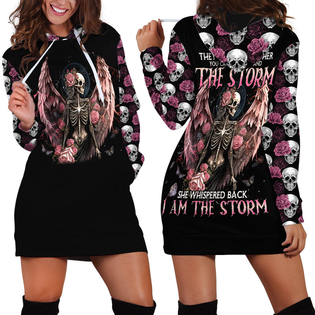 Black hoodie dress: front angel-skull & roses; back skull-rose print with 'I AM THE STORM'