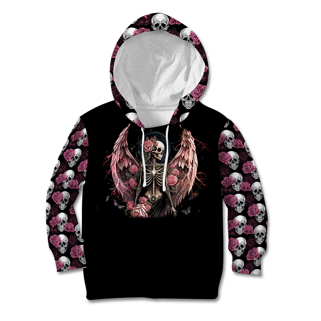 Black kid zip hoodie with hood up, angel skull chest graphic, pink rose-and-skull sleeves.