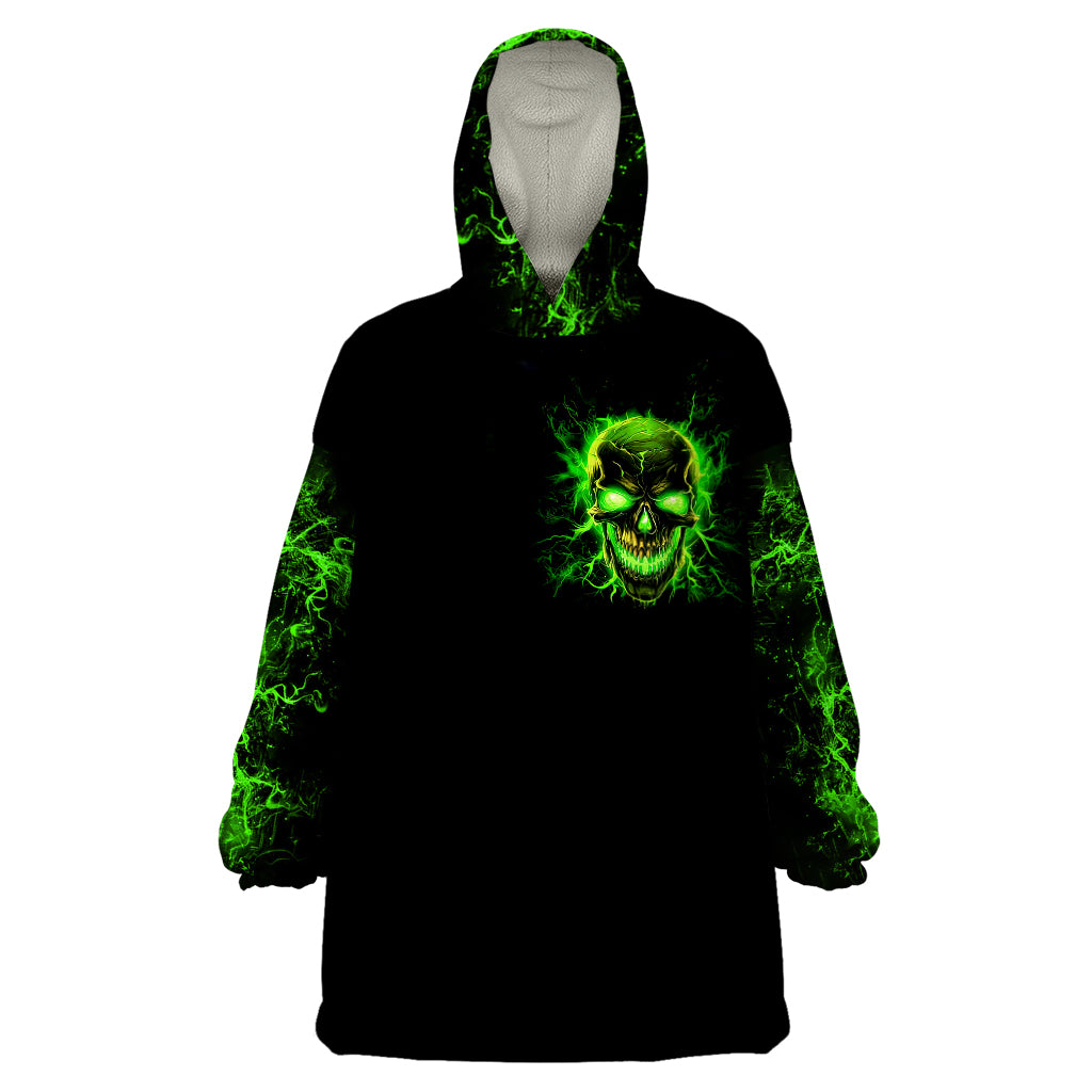 Black hooded wearable blanket hoodie with neon green skull graphic on chest.