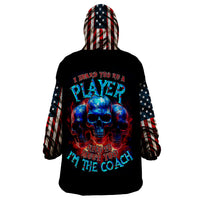 Black wearable blanket hoodie with hood, American skull and player graphic on back