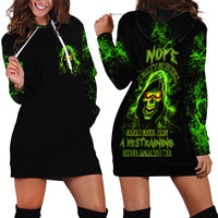 Black hoodie dress: front and back with green skull graphic and statement text