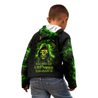 Black hoodie worn by child with green skull back graphic
