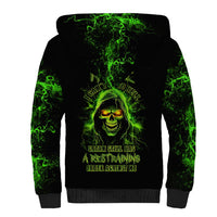 Black sherpa hoodie with green skull graphic on front and full hood
