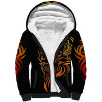 Black unisex sherpa hoodie with orange-gold skull tattoo graphic, hood and pouch pocket
