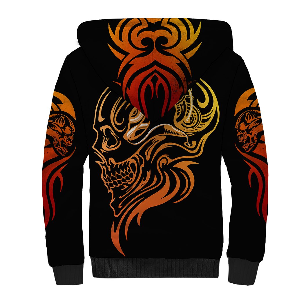Black unisex sherpa hoodie with large orange-gold skull tattoo design on back, hood