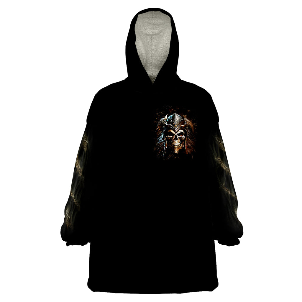 Black wearable blanket hoodie with skull graphic on chest and hood