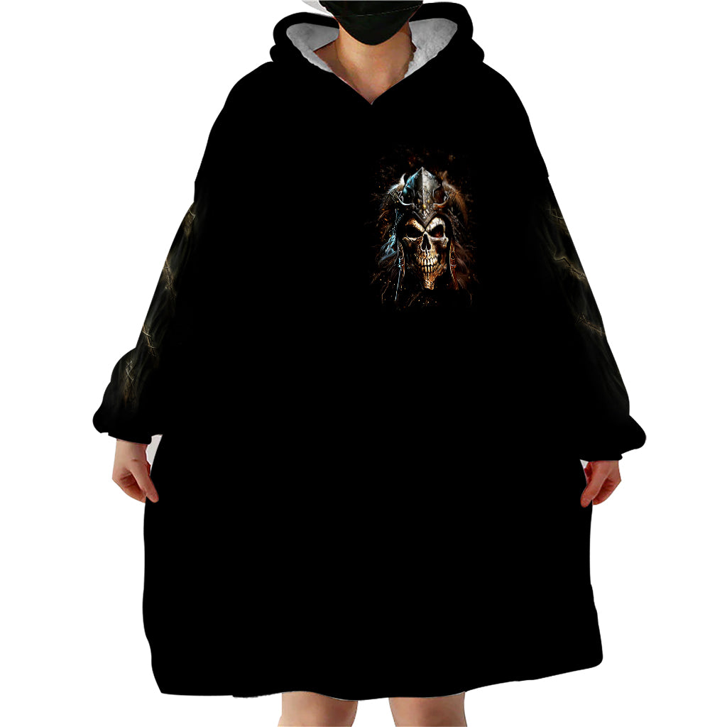 Black wearable blanket hoodie with skull graphic and roomy hood, front view