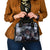skulls-roses-and-white-snakes-shoulder-handbag