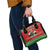 its-not-christmas-unil-hans-gruber-falls-from-nakatomi-plaza-shoulder-handbag-xmas-eve-1988