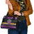 nakatomi-plaza-christmas-party-1988-shoulder-handbag-dj-satan-claus