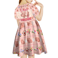 Moodeng Christmas Kid Short Sleeve Dress Cute Hippo Holiday with Pastel Floral Festive Vibes - Wonder Print Shop
