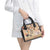 Our Beats Redefine The World African Shoulder Handbag