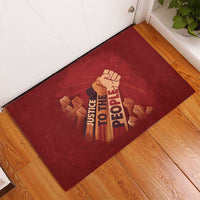 Justice To The People Rubber Doormat African Raised Fist