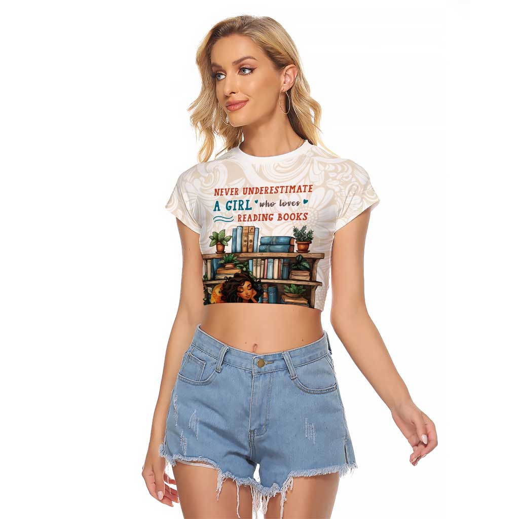 Never Underestimate A Girl Who Loves Reading Books Raglan Cropped T Shirt