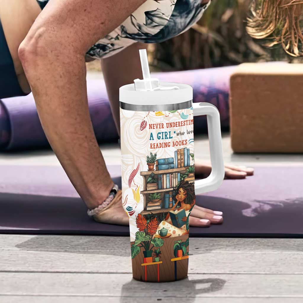 Never Underestimate A Girl Who Loves Reading Books Tumbler With Handle