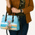 Christmas In July Leather Bag I Am The Flamingo Elf - Wonder Print Shop