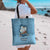 Santa Claus Is Kayaking To Town Tote Bag Merry Christmas - Wonder Print Shop