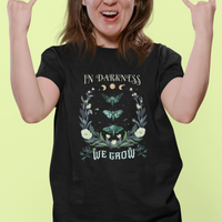 Women’s black t-shirt with teal moth wreath front print and crew neck