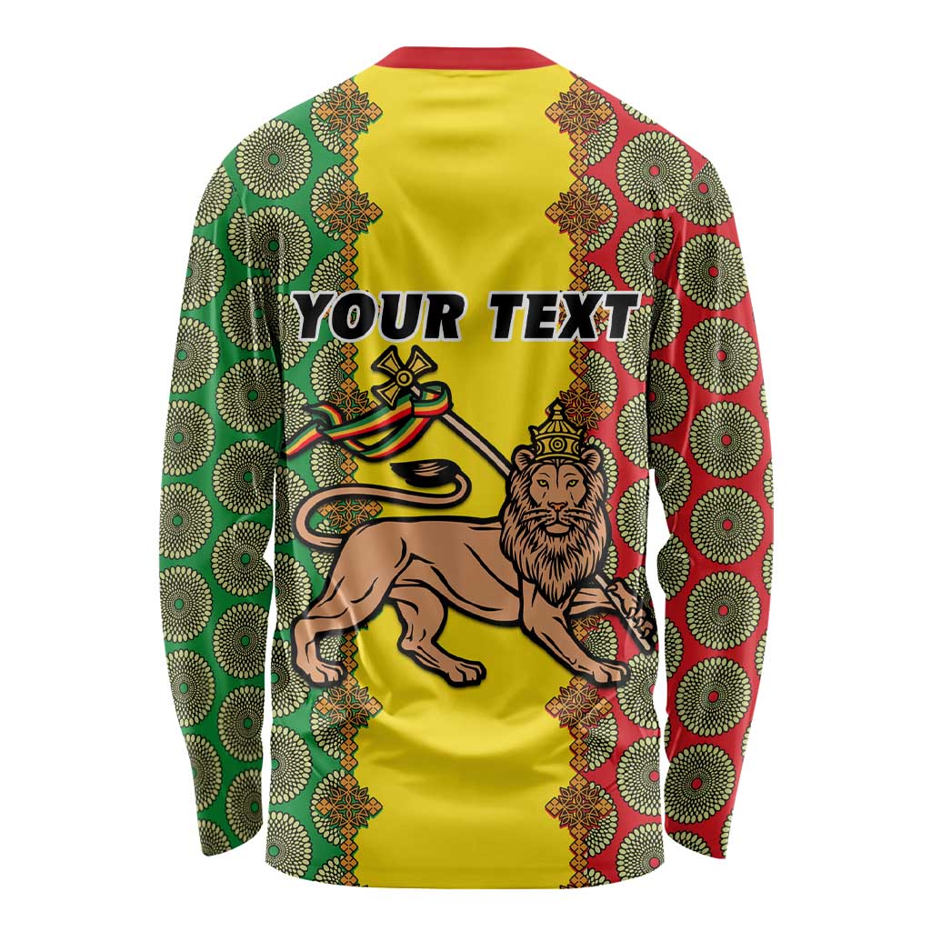 Yellow long-sleeve shirt with lion and green/red Ethiopian pattern, 'YOUR TEXT' print