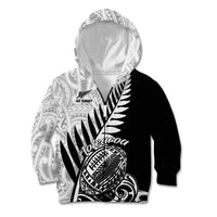 Kids’ black rugby hoodie with large white fern and shield print on chest, hood