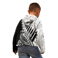 Kids’ rugby hoodie with black back panel, white Maori pattern and fern graphic