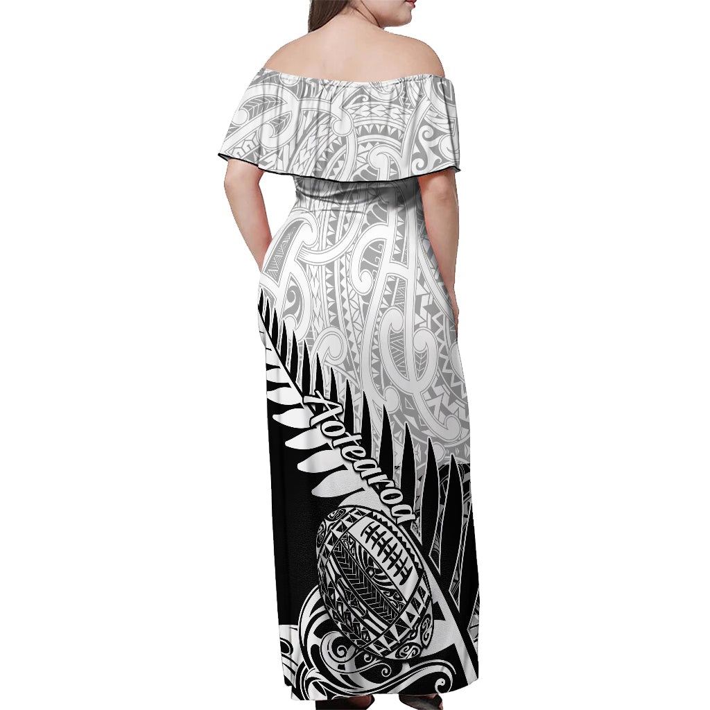 Women’s off-shoulder maxi dress, back view with black-and-white tribal print and ruffle