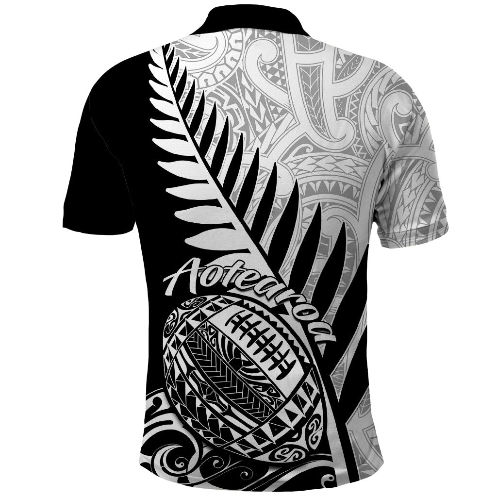 Black rugby polo shirt, back view with large fern leaf and Maori-style artwork
