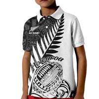 Kids white rugby polo shirt with black Maori-style fern and tribal graphic on front
