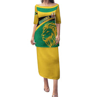 Green and yellow off-shoulder long dress with lion graphic and Jamaica text