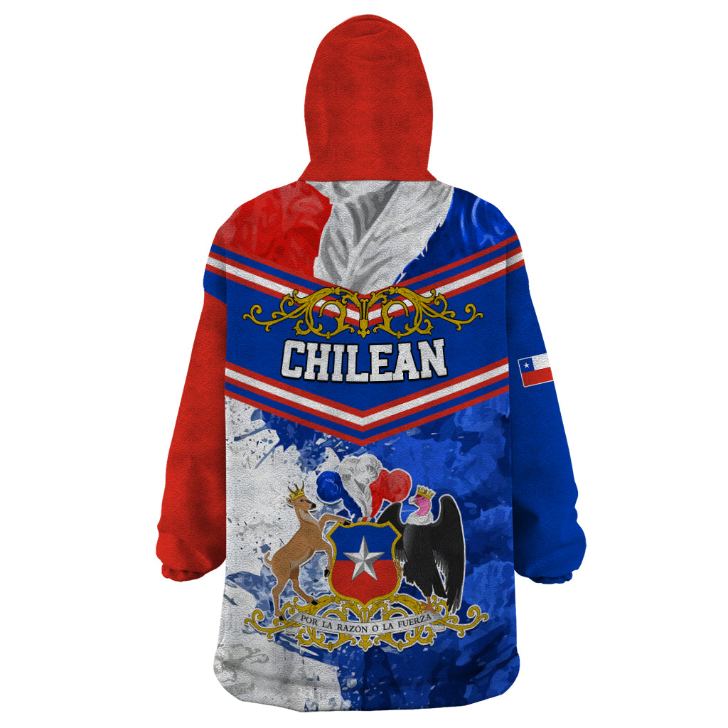 Wearable blanket hoodie with red hood, blue back print, Chilean text and crest emblem.