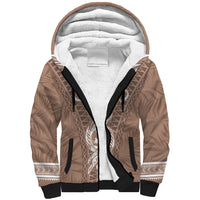 Sherpa hoodie with brown tropical print, black trim, and white fleece lining