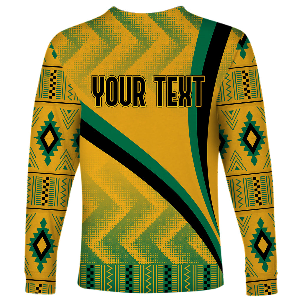 Long-sleeve shirt with yellow kente pattern, green trim, black diagonal stripe, 'Your Text' spot