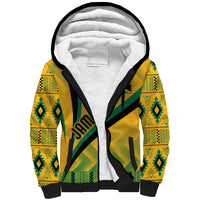Yellow sherpa hoodie with green kente-style pattern, black trim, white fleece-lined hood