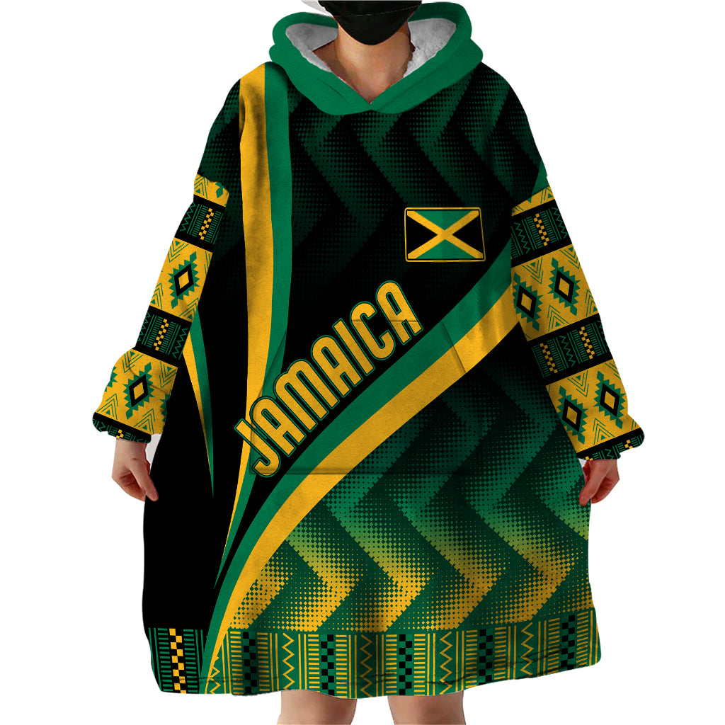 Wearable blanket hoodie with green hood, Jamaica diagonal print and kente sleeve patterns