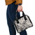 polynesia-shoulder-handbag-tribal-polynesian-spirit-with-beige-pacific-flowers