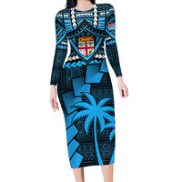 Blue long-sleeve bodycon midi dress with tribal geometric print and shield emblem