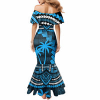Women’s blue off-shoulder mermaid dress, bold geometric pattern with palm motifs