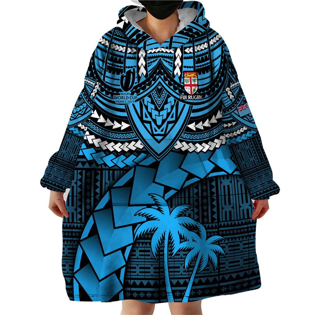 Fiji rugby blanket hoodie, blue hooded poncho style with palm-and-tile front design