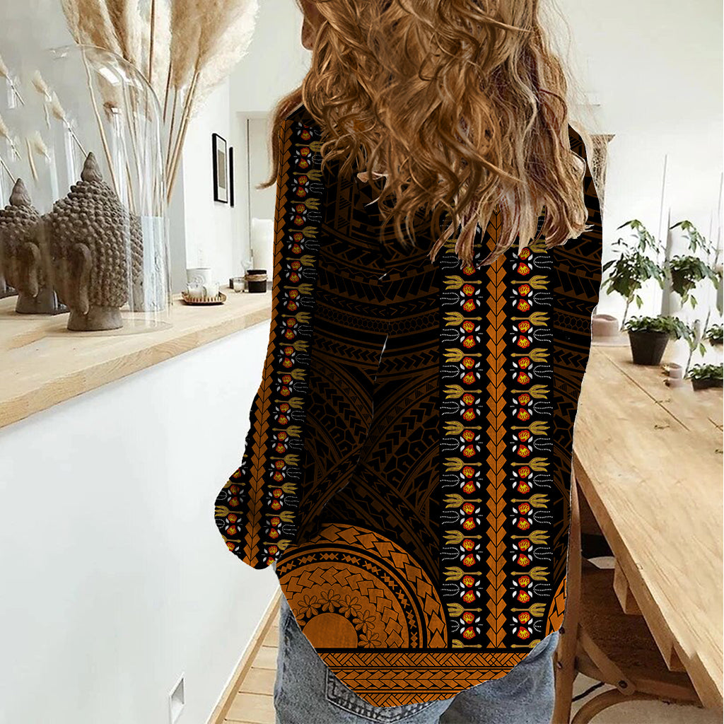 Women's dashiki-style shirt black with gold tribal pattern on sleeves and hem, side view
