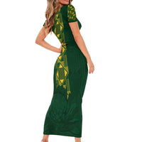 Green fitted long rugby dress with short sleeves, geometric print and springbok emblem
