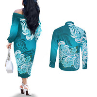 Back view: aqua off-shoulder midi dress and matching button-up shirt, floral tribal print