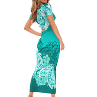 Turquoise short-sleeve fitted midi dress with floral tribal tattoo print, side view