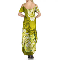 Women’s yellow maxi dress back view, floral tribal print with thin straps and off-shoulder
